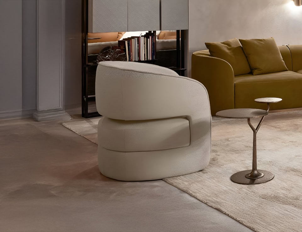 Leather sofa chair with curved backrest in living room setting