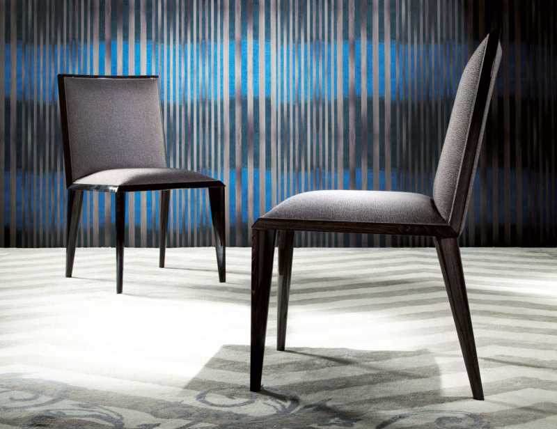 Authentic modern Italian chair with grey fabric