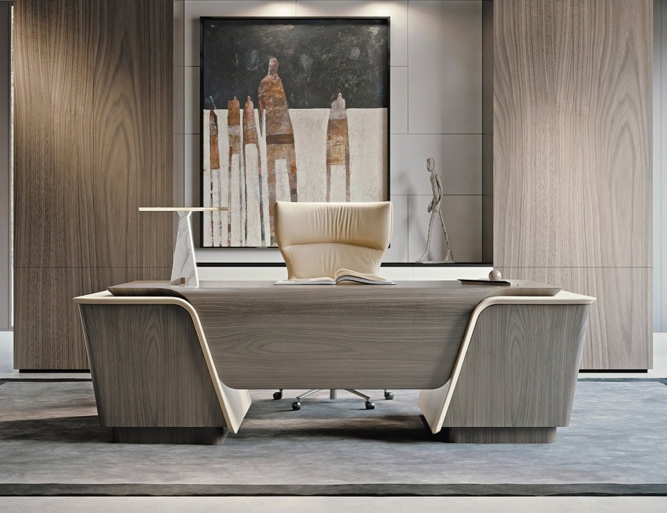 Wood desk with walnut finish in office setting