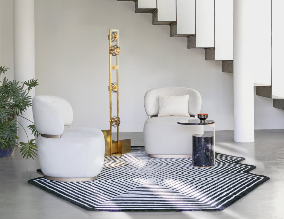 Fabric swivel armchairs in a living room setting