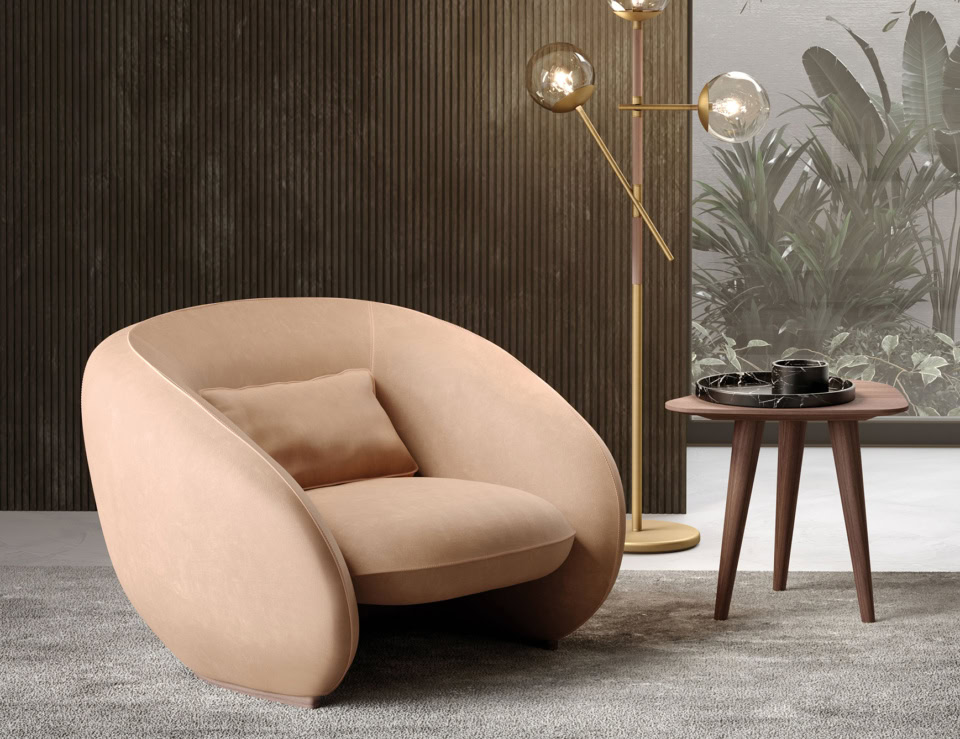 Leather armchair with curved design in living room setting