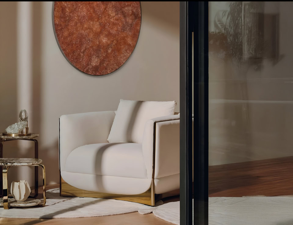 Leather sofa chair with metal base in living room setting