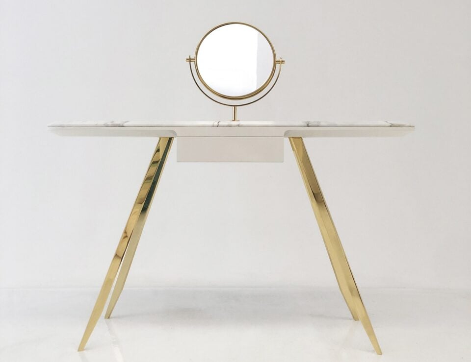 Metal vanity table with marble top and round mirror