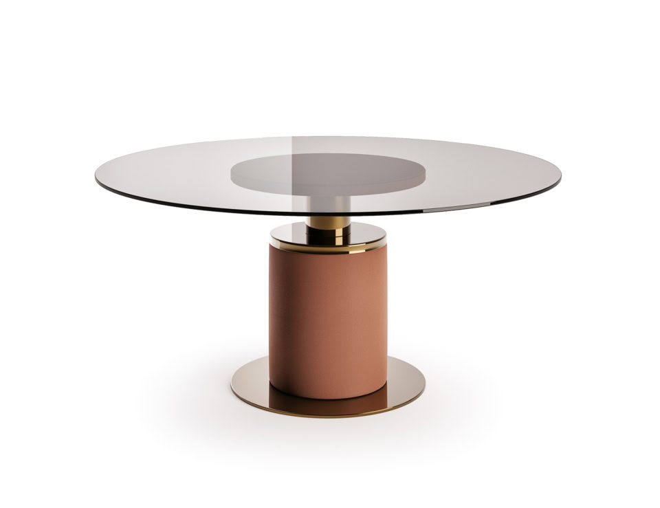 Round glass dining table with cylindrical metal base