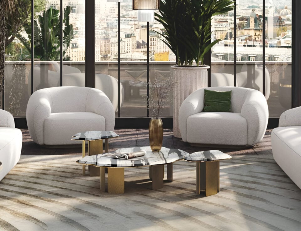 Fabric swivel armchair with rounded design in a living room setting