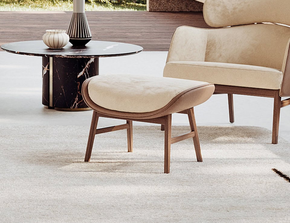 Fabric pouf with wooden frame shown in a living room setting