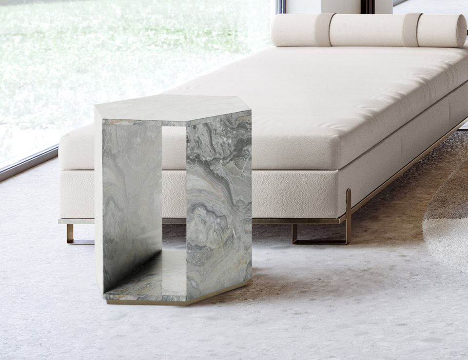 Dedalo marble side table in Grigio Orobico finish beside a sofa