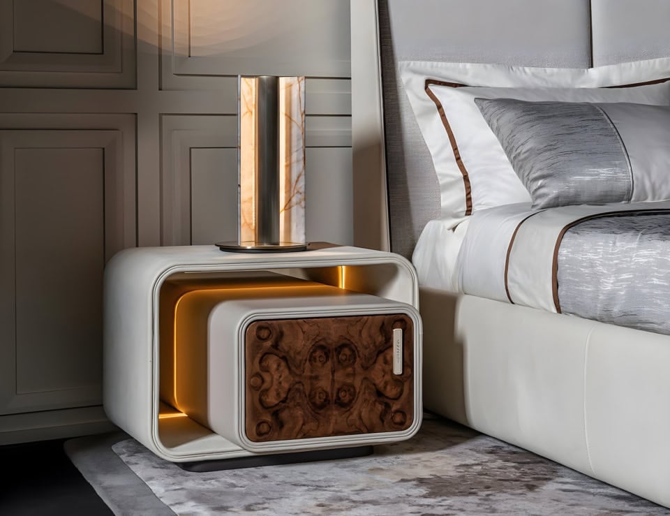 Leather and wood bedside table with drawer beside bed