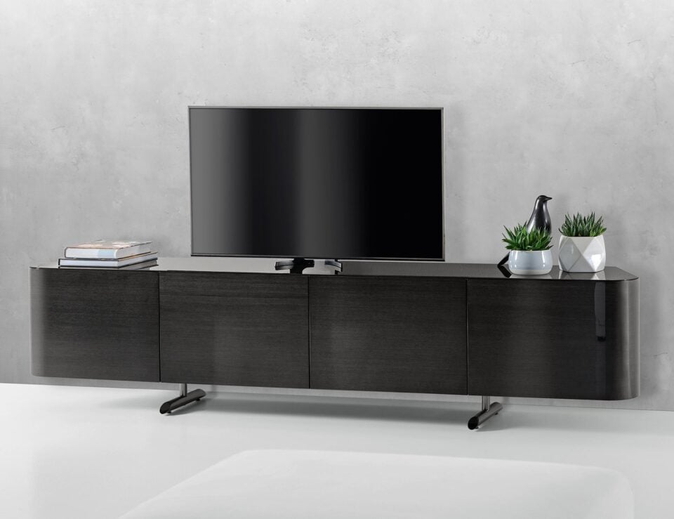 Wooden chest of drawers with dark finish and metal legs