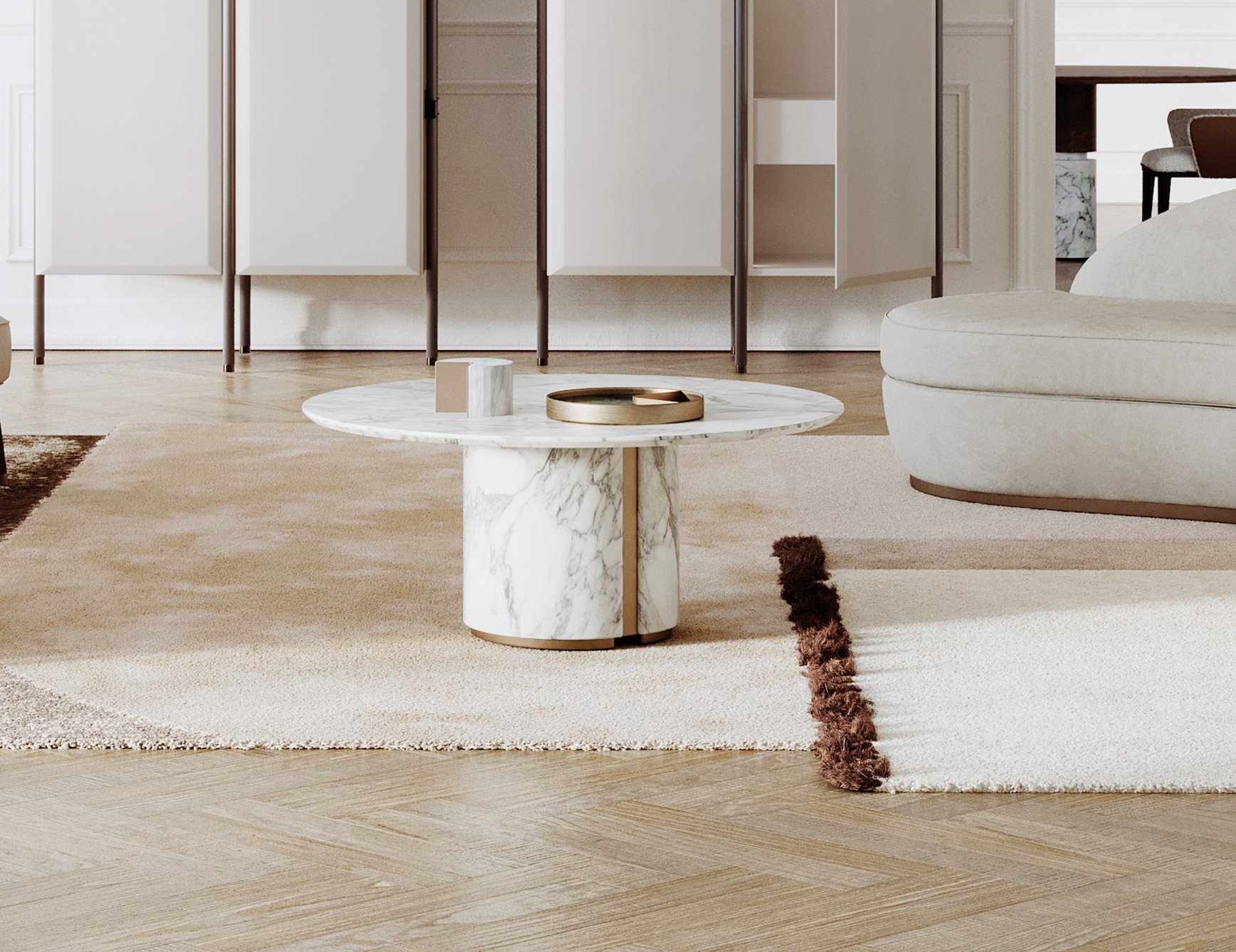 Ercole Low - Round marble coffee table with Calacatta finish in living room setting