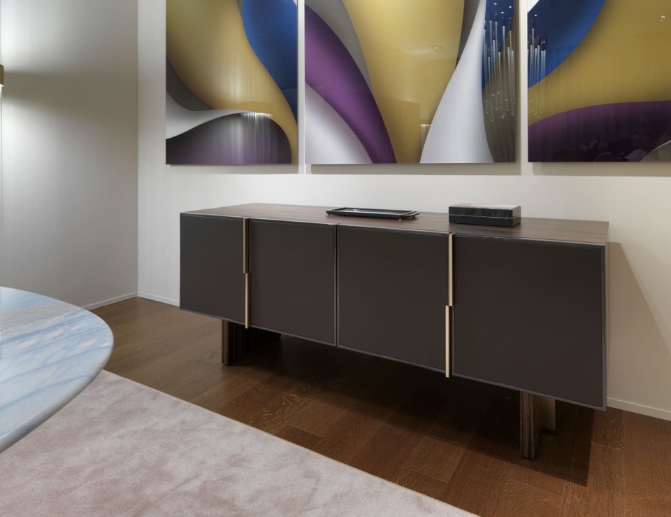 Wood credenza with Ebony Makassar finish in a living room setting