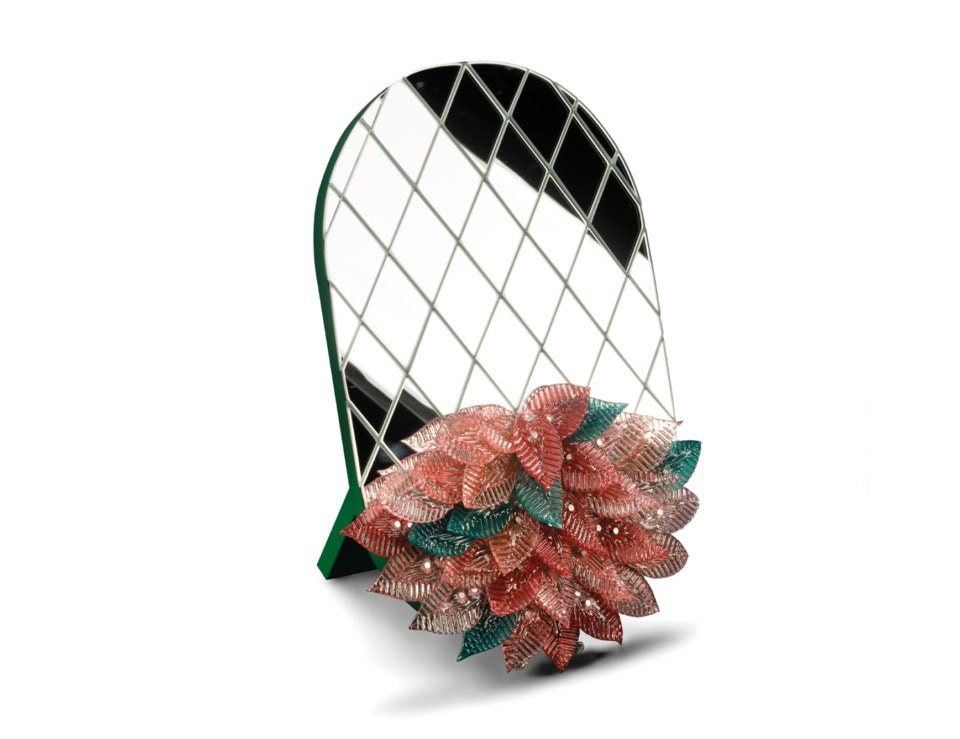 Decorative mirror with diamond-patterned glass and leaf-shaped accents