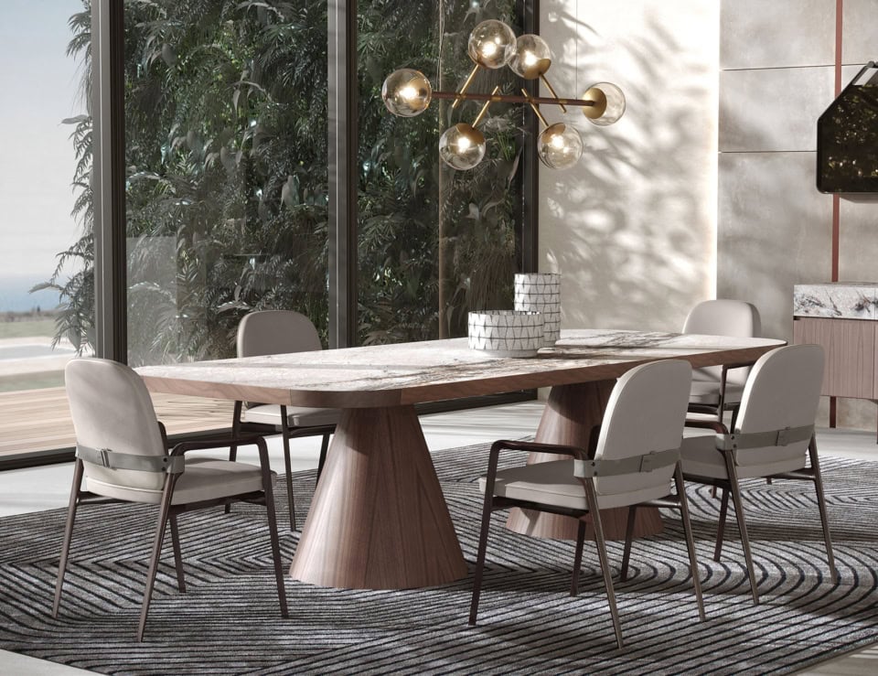 Marble dining table with Arabescato finish and wooden base in dining room setting