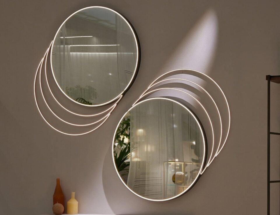 Round metal mirrors with circular frame design mounted on wall