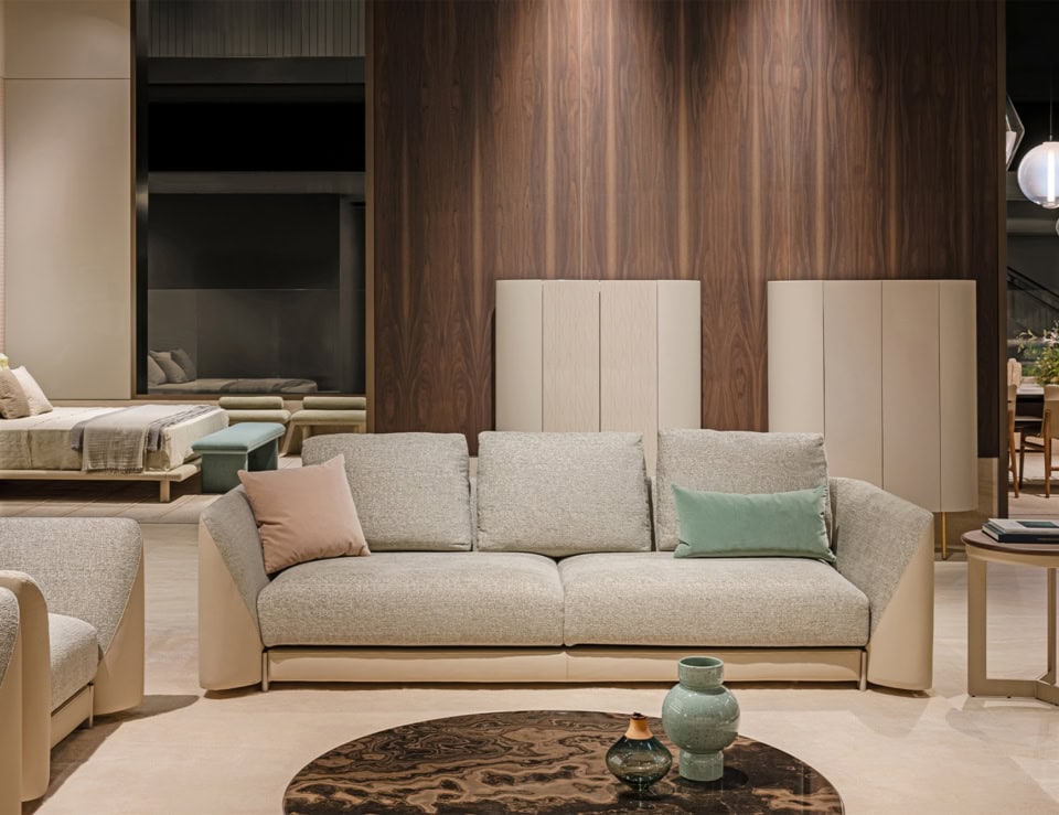 Leather sofa with fabric cushions in a living room setting