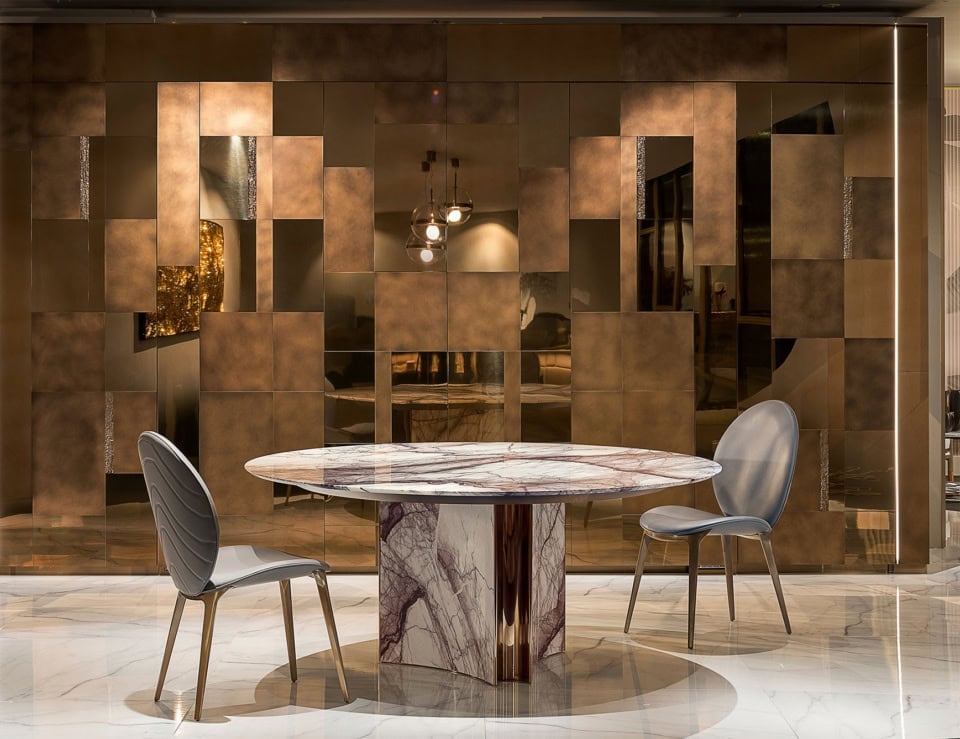 Round marble and wood dining table with marble finish