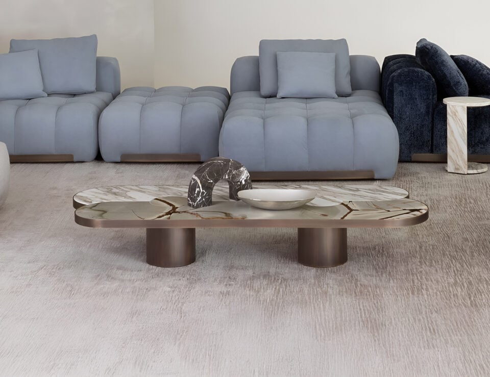 Marble coffee table with Calacatta Oro and Guatemala finish in living room setting