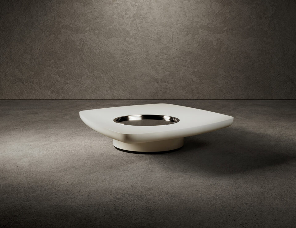 Square wooden coffee table with circular metal inset top