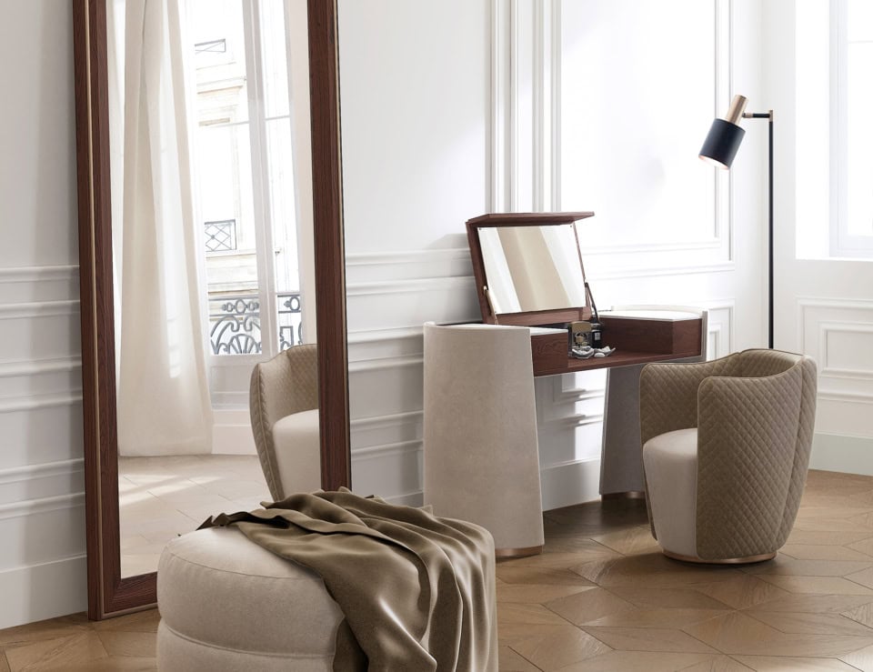 Veneered wood desk with mirror and upholstered chair in room