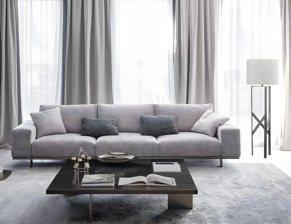 Leather sofa with metal legs in a living room setting