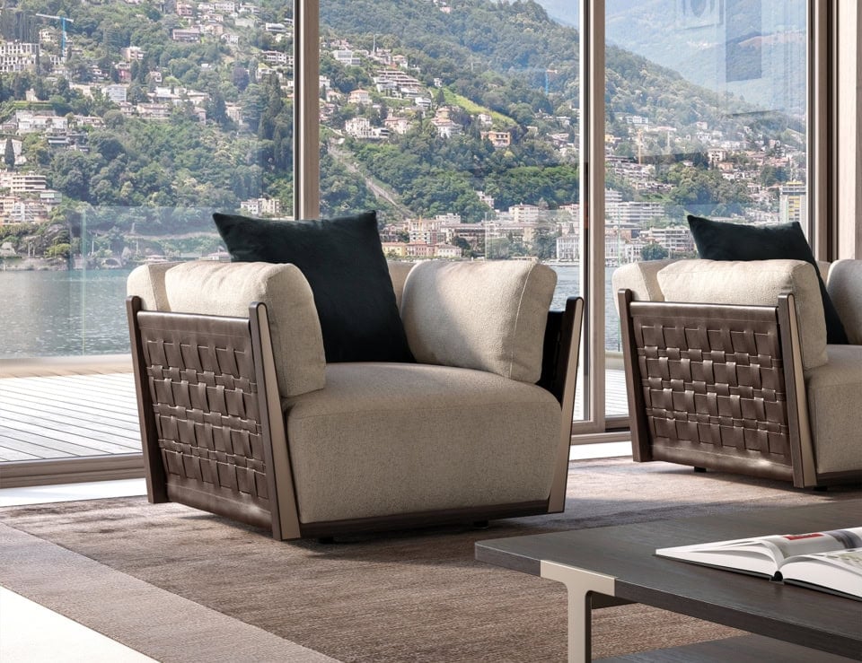Leather armchair with woven side panels in living room setting