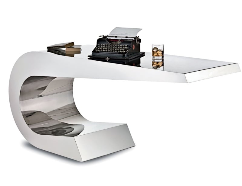 Curved white and chrome metal desk with glossy finish