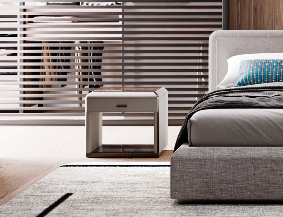 Orion L leather bedside table with drawer and open shelf beside bed