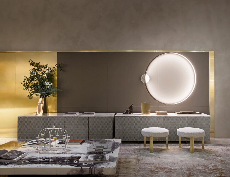 Leather credenza with storage compartments set against a wall panel