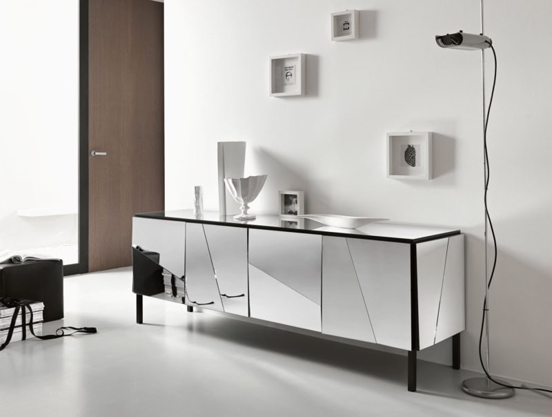 Rectangular mirrored glass sideboard with black metal frame in living room