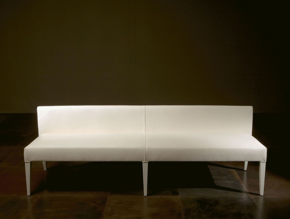 Leather banquette bench seating with backrest and wooden legs
