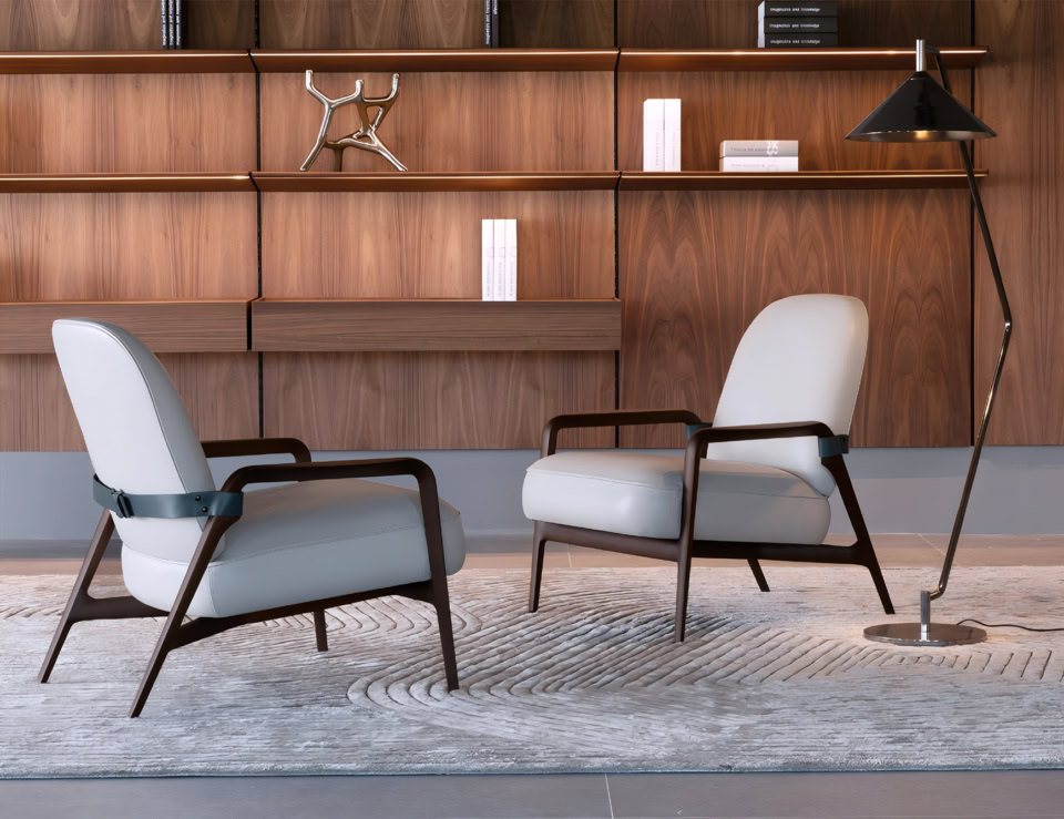 Leather armchairs with wooden frame placed in a living room setting