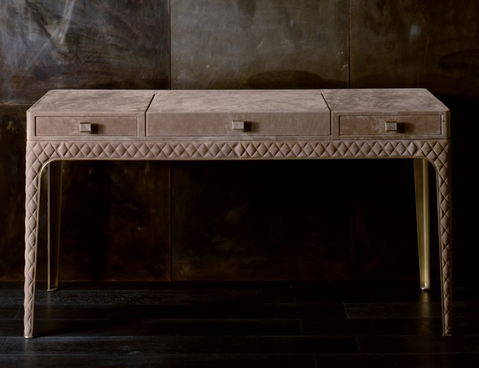 Leather vanity table with three drawers and quilted detailing