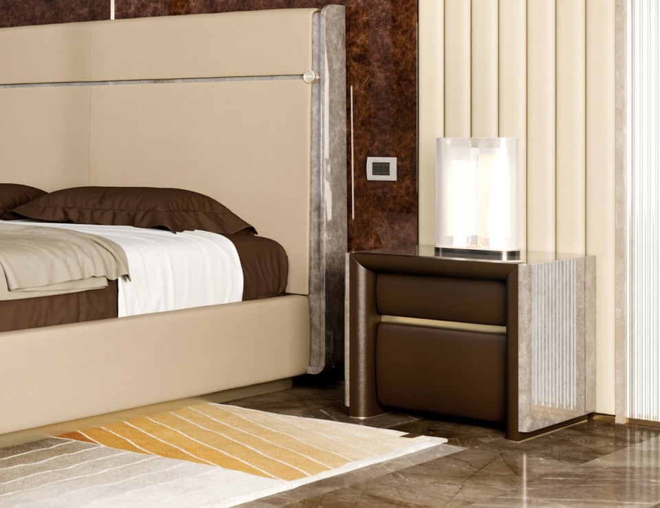 Leather bedside table with walnut finish and two drawers beside bed