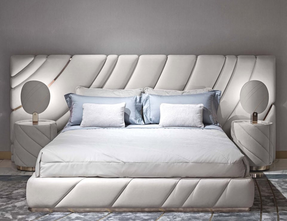 Fabric storage bed with upholstered headboard in bedroom setting