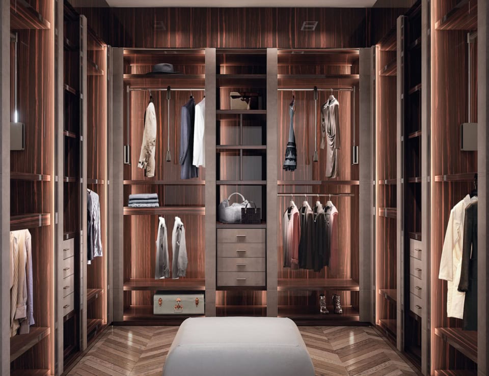 Wood walk-in closet with open shelving and hanging space
