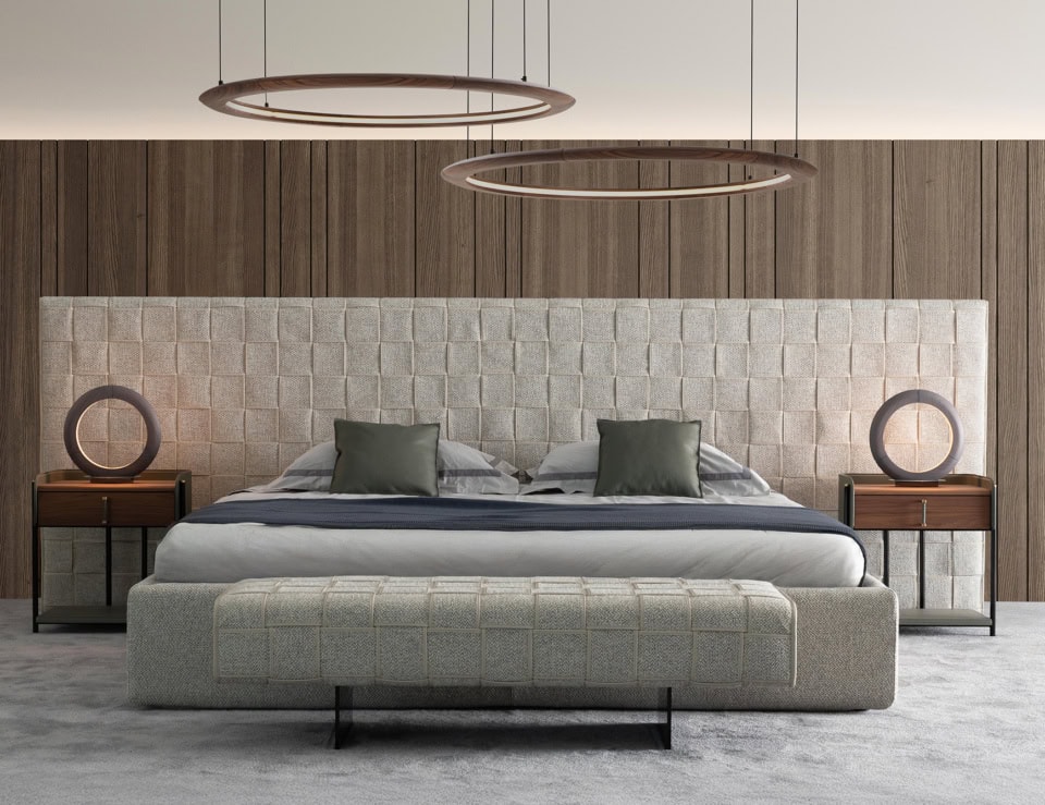Leather storage bed with upholstered headboard in bedroom setting