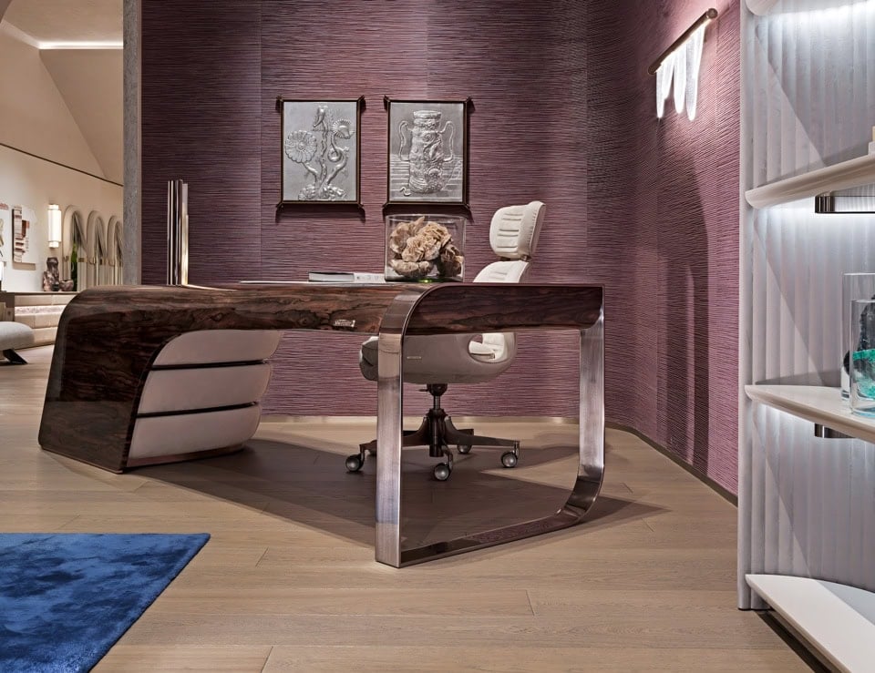 Wood desk with walnut root finish in office setting