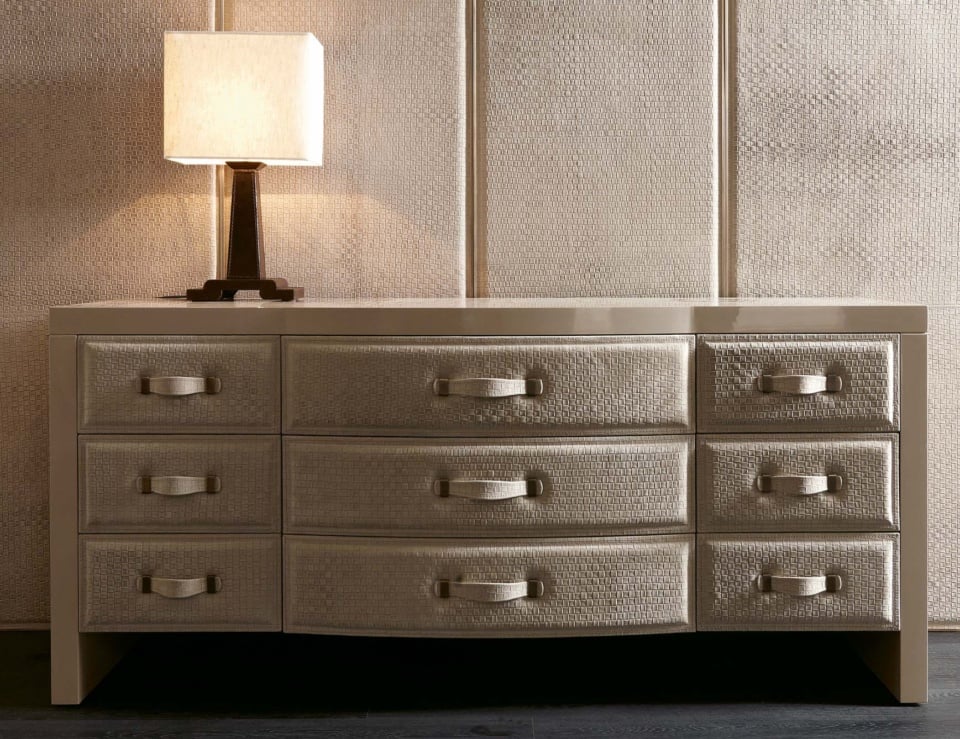 Leather chest of drawers with nine drawers in bedroom setting